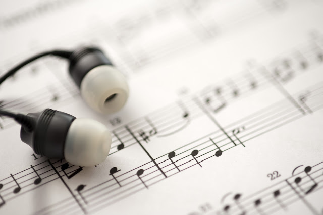 music sheet, headphones