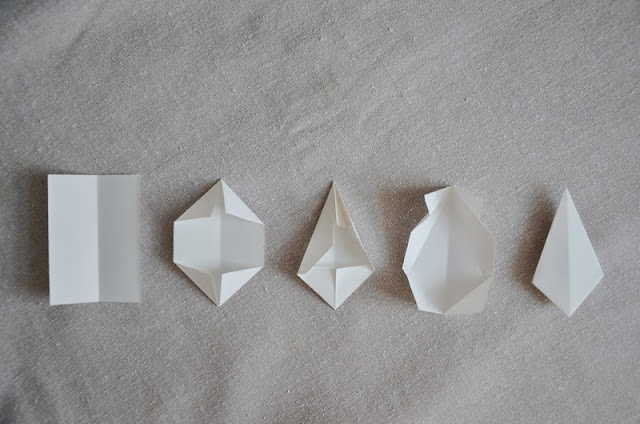 How to make beautiful white paper stars and hang them around your house
